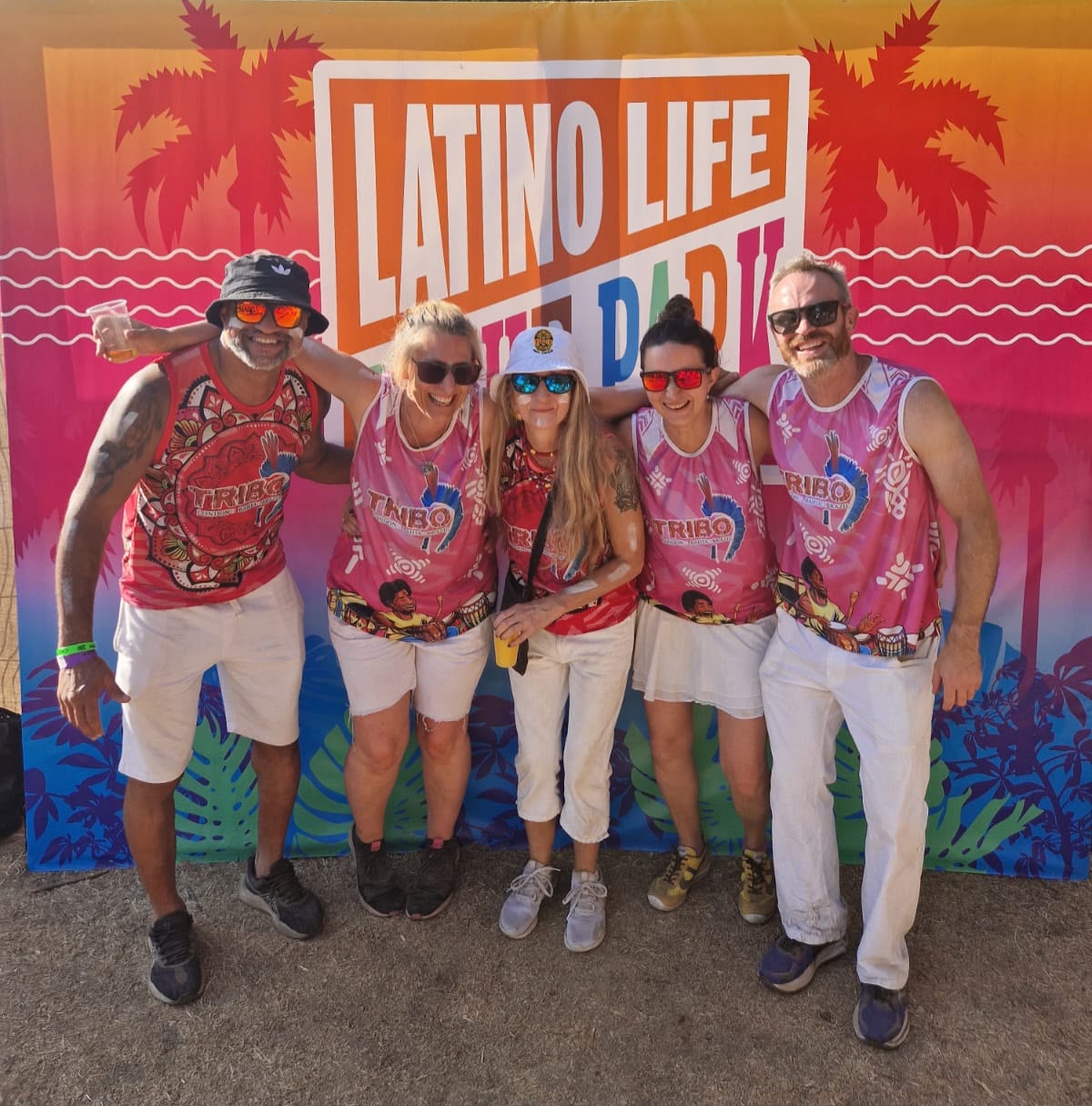 Samba-reggae ensemble performing on a festival stage at night
